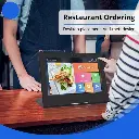Customer self-ordering at cafe counter terminal